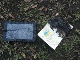 Активисту Евромайдана разбили планшет, сожгли паспорт и обещали сломать руки и ноги (ФОТО)