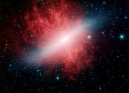 Космический телескоп открыл красную пылающую галактику