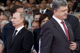 Путин назвал позитивными состоявшиеся переговоры с Порошенко