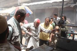 Вертолет сирийской армии сбросил две бомбы на лагерь беженцев в провинции Идлиб