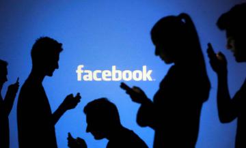 Пользователи социальной сети Facebook протестуют против нового "смайлика"