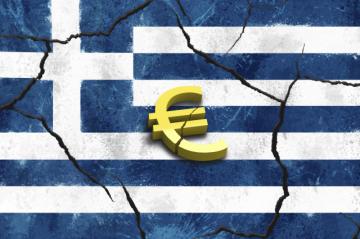 МВФ: Греция не получит денег, пока не расплатится по долгам