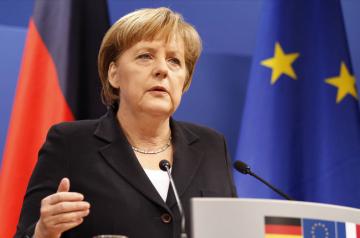 Меркель считает, что снимать санкции с России пока рано