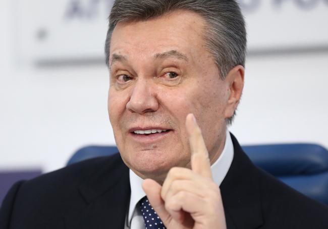 Суд дал Януковичу 13 лет за госизмену