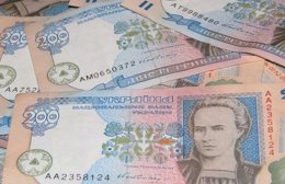 Спор о выезде Тимошенко на лечение давит на курс гривны