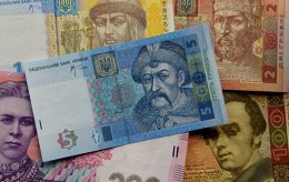 На закрытии межбанка упала гривна