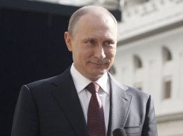За аннексию Крыма Путина отчеканили на монетах (ФОТО)