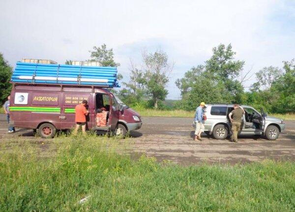 Активисты в трудных условиях обеспечили подачу воды украинским бойцам (ФОТО)