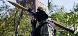 В Мариуполе из гранатомета обстреляли машину с украинскими пограничниками (ВИДЕО)