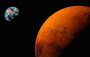 Ученые запечатлели замерзшую воду на Марсе (ФОТО)