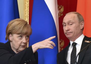 Меркель и Путин обсудили проведение выборов на Донбассе