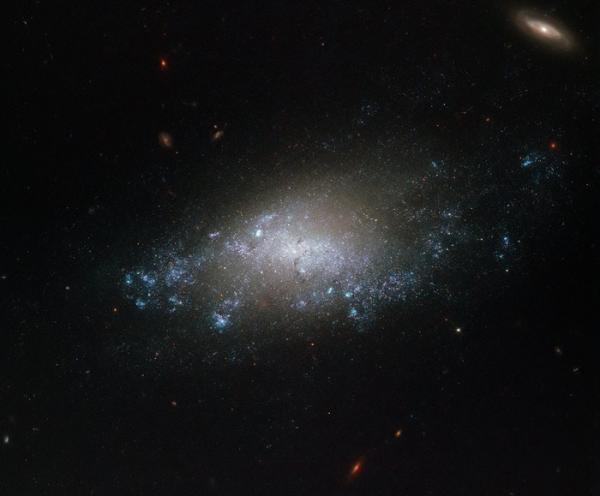 Телескоп Хаббл сделал новое изображение спиральной галактики (ФОТО)