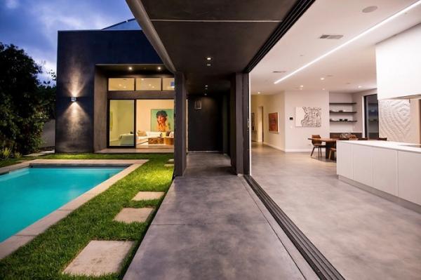 Динамика и оригинальность: дом с эффектным волнообразным фасадом (ФОТО)