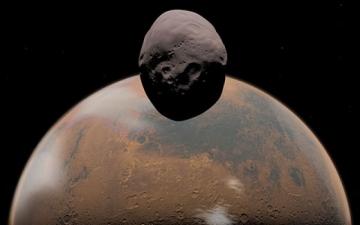 NASA показало снимки спутника Красной планеты Деймоса (ФОТО)