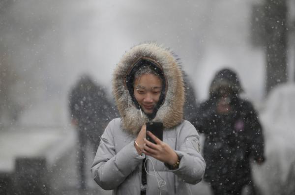 Путешествие в Поднебесную: кадры повседневной жизни в столице Китая (ФОТО)