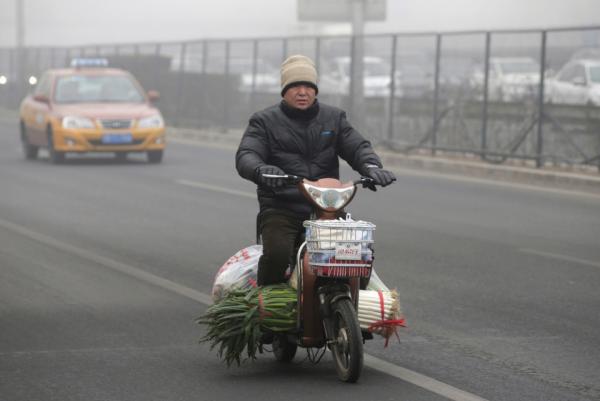Путешествие в Поднебесную: кадры повседневной жизни в столице Китая (ФОТО)