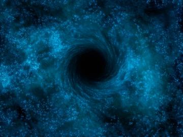 Астрономам впервые удалось сфотографировать черную дыру (ФОТО)